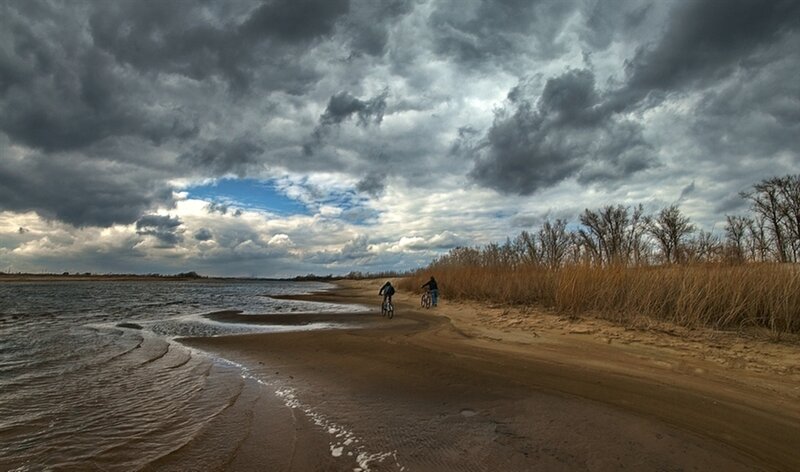 Two People on Bicycles — Gray