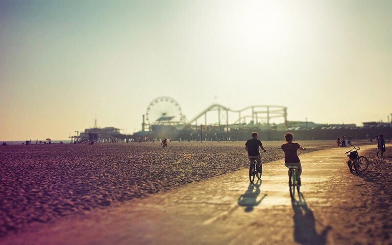Two People on Bicycles