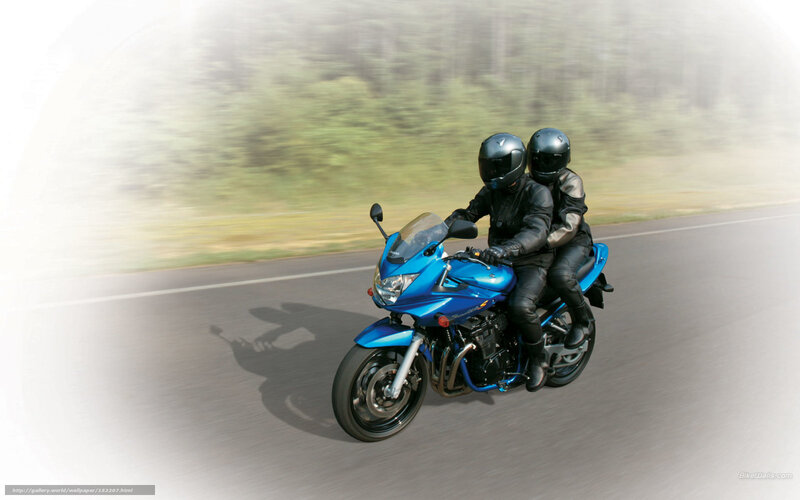 Two People on Blue Motorcycle