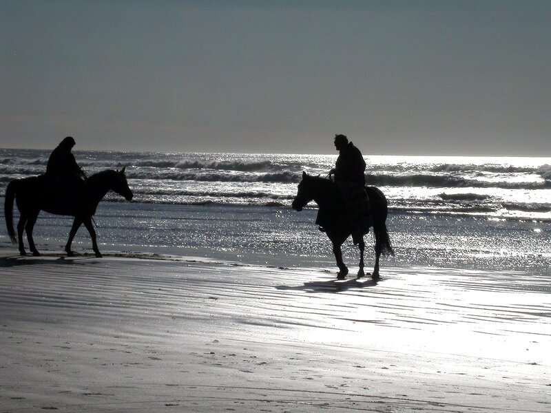 Two People on Horses — Black