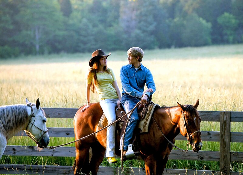 Two People on Horses — Brown, Serene
