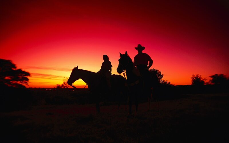 Two People on Horses — Red, Dramatic