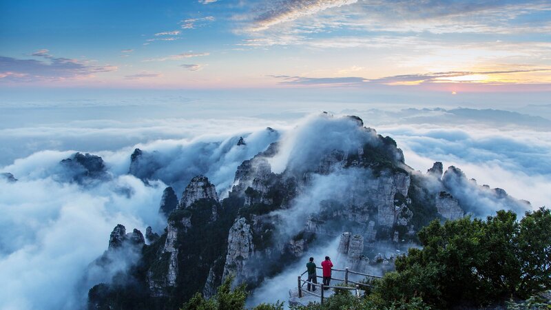Two People on Mountain Peak