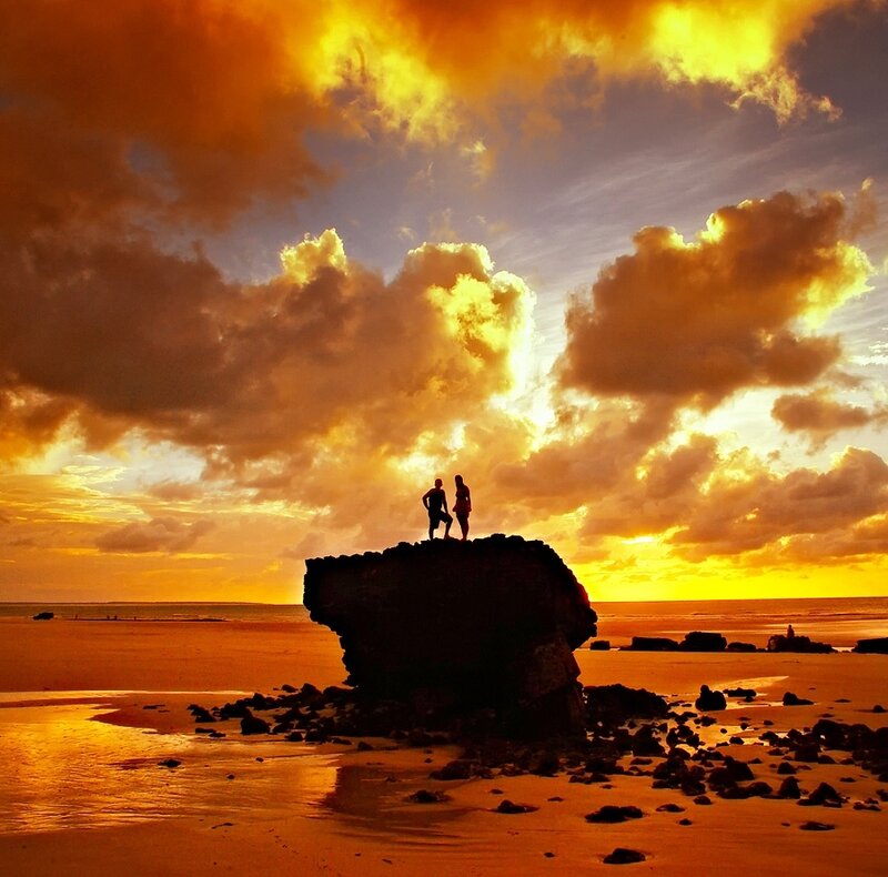 Two People on Rock