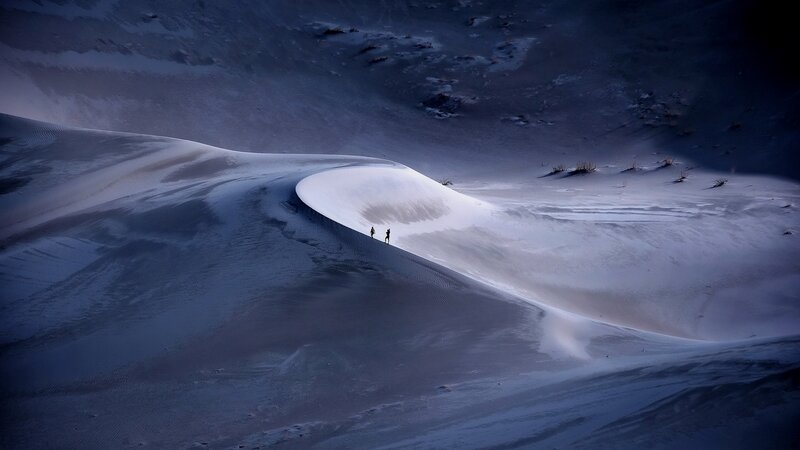 Two People on Sand Dunes — Blue, Dramatic