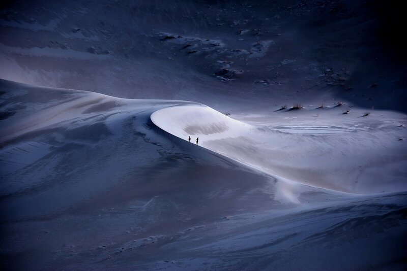 Two People on Sand Dunes — Blue