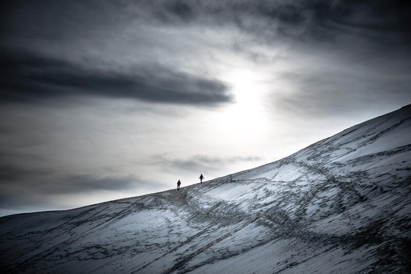 Two People on Snowy Slope