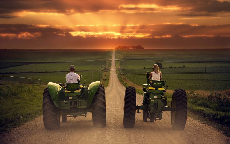 Two People on Tractors
