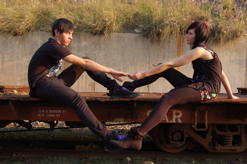Two People on Train Car