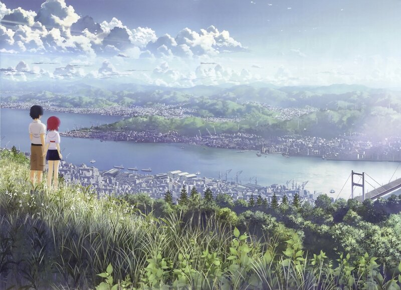 Two people overlooking a coastal city