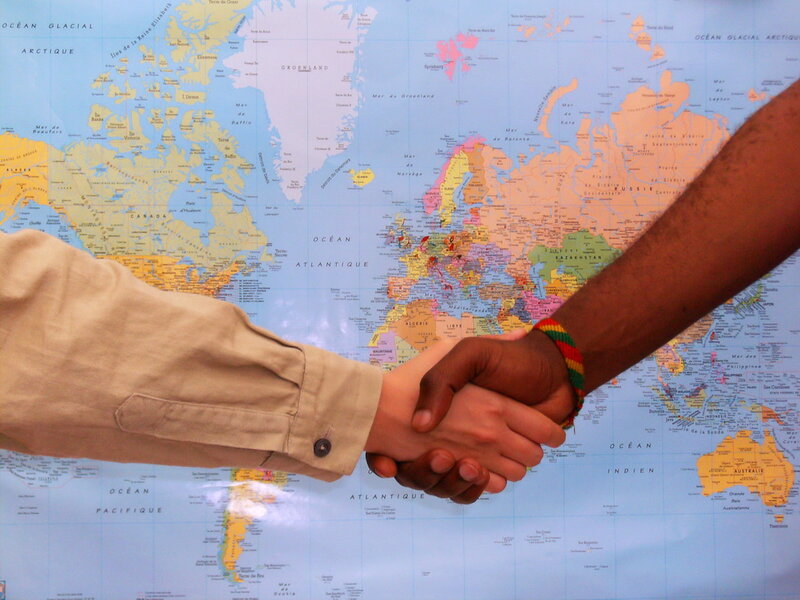 Two People Shaking Hands — Blue
