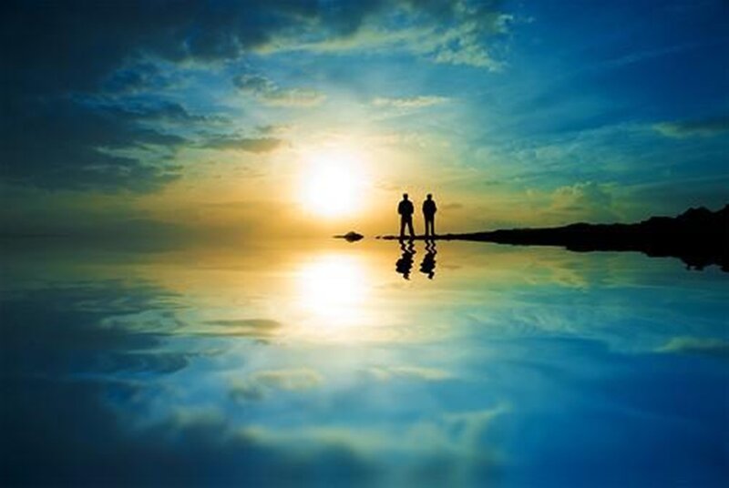 Two People Silhouetted — Blue, Serene, Sunset