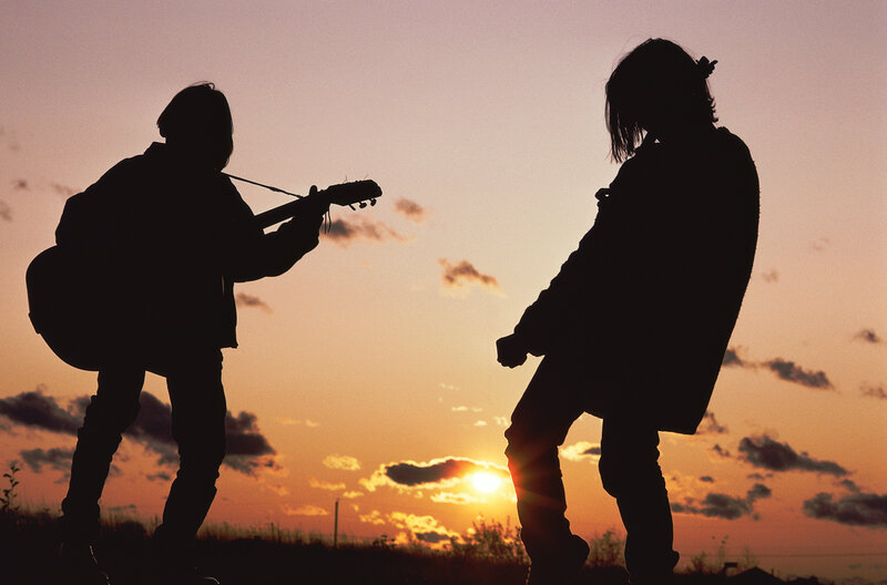 Two People Silhouetted