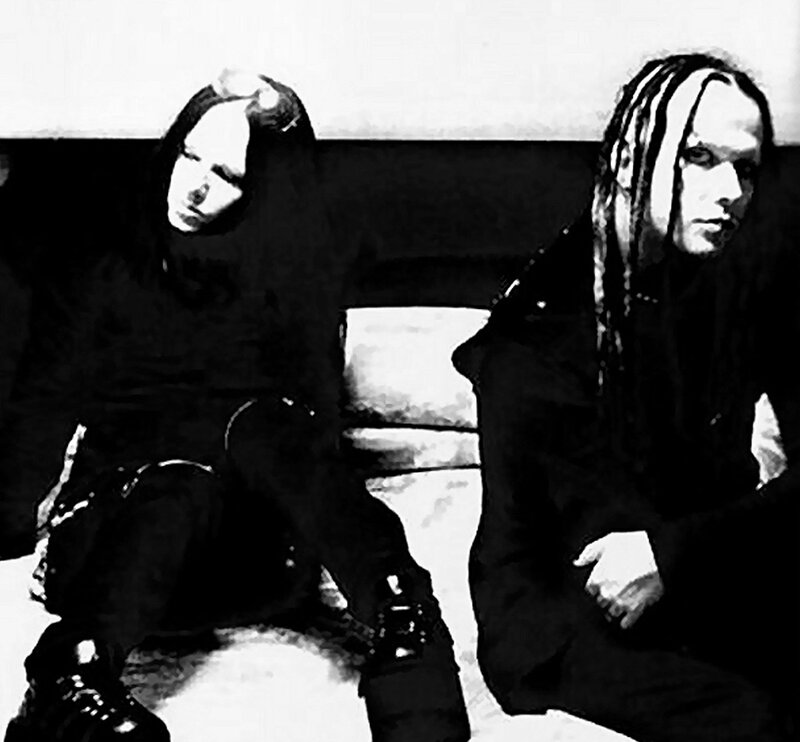 Two People Sitting — Black