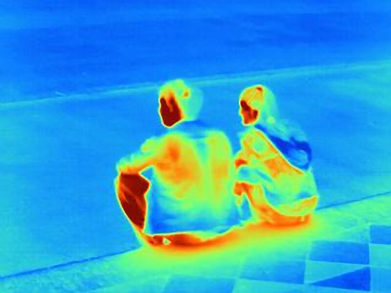 Two People Sitting — Blue