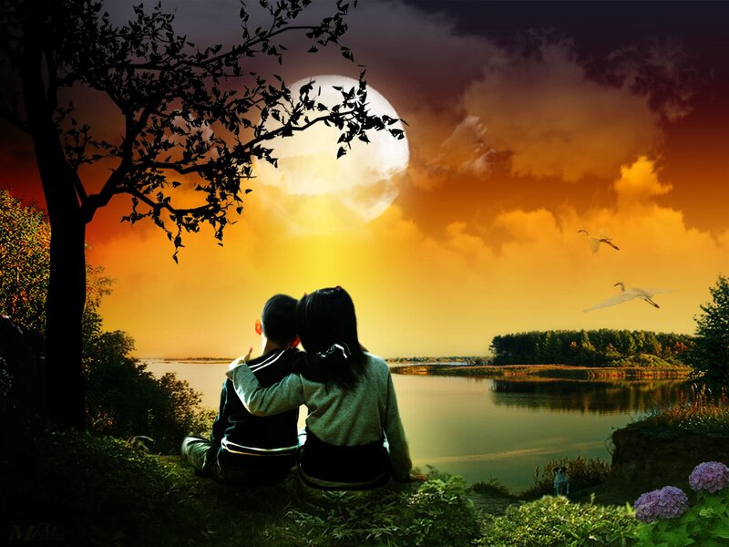 Two People Sitting by Lake