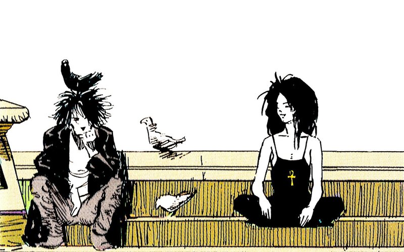 Two people sitting on a bench