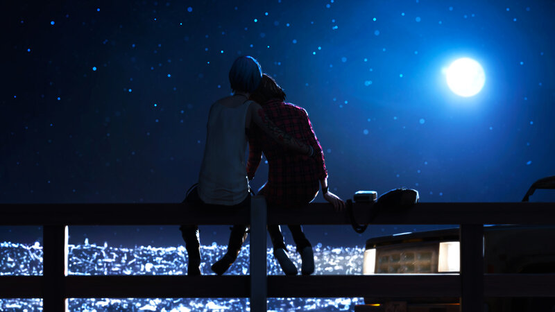 Two People Sitting on Railing