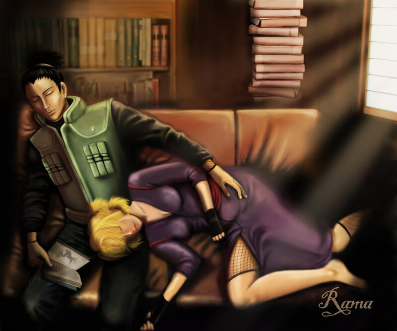 Two People Sleeping on Couch