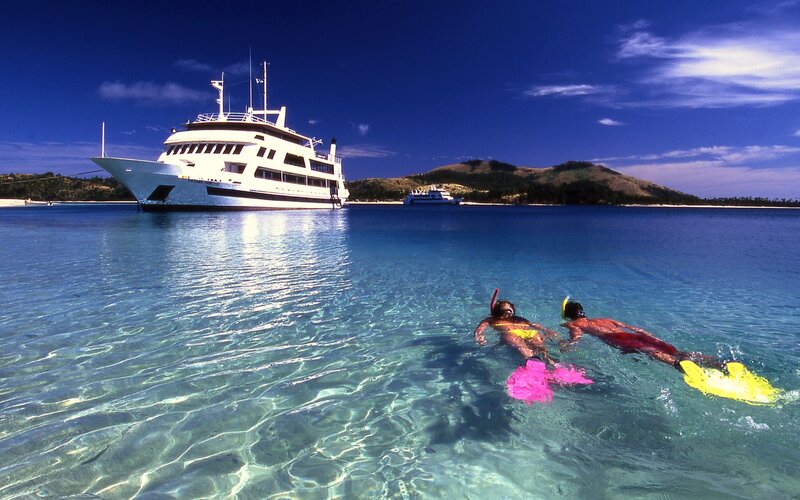 Two People Snorkeling — Blue, Serene, Afternoon