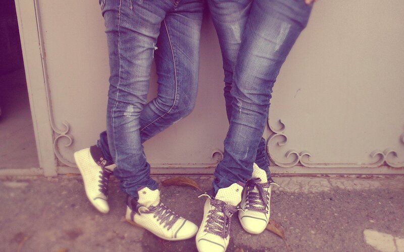 two people standing close