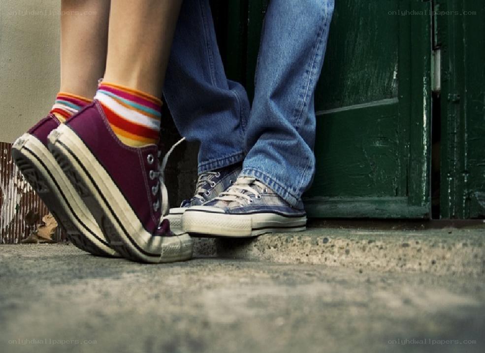 two people standing close