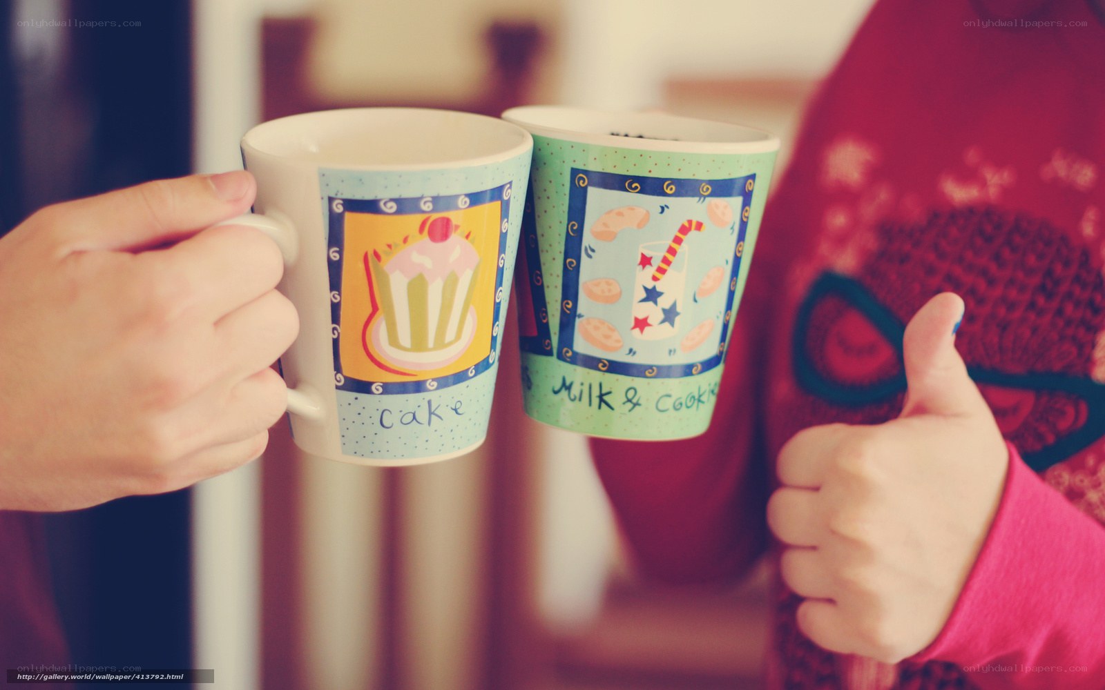 Two people toasting with mugs