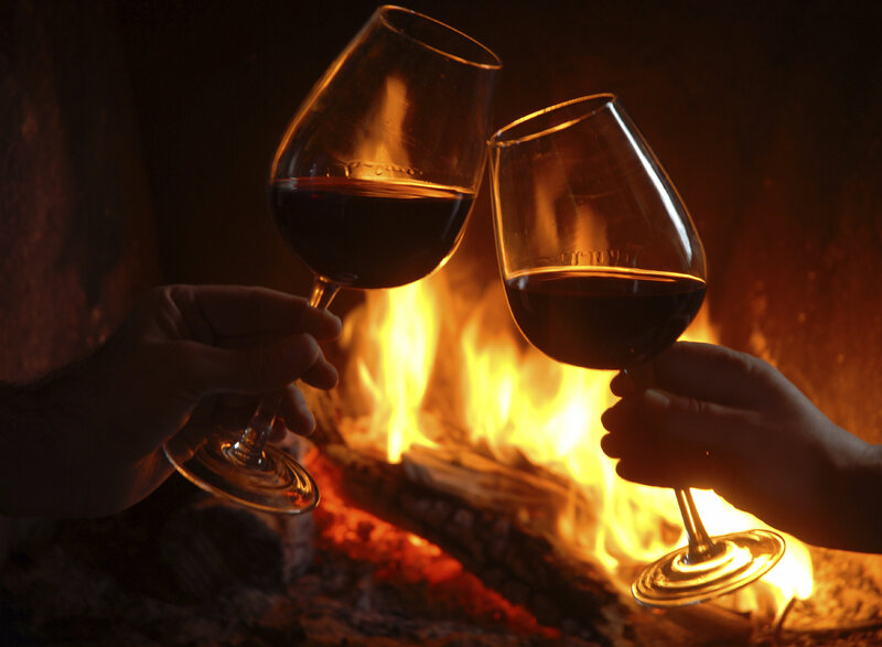 Two People Toasting with Wine