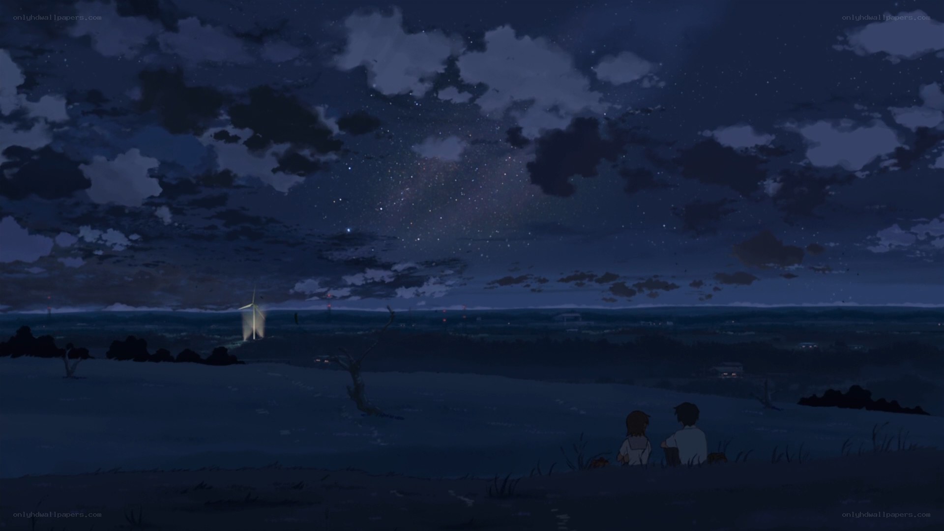 Two people under a starry sky