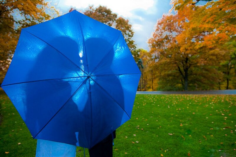 Two People under Umbrella