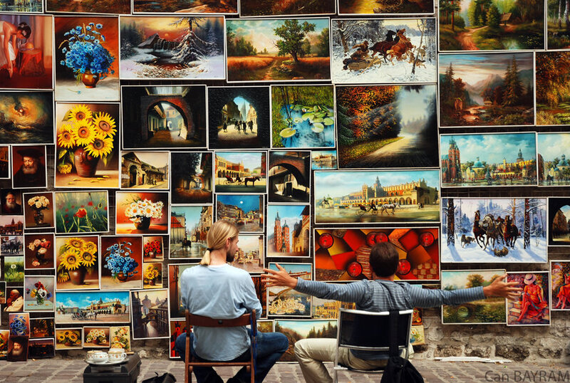Two People Viewing Paintings