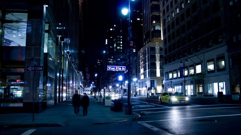 Two People Walking at Night — Blue