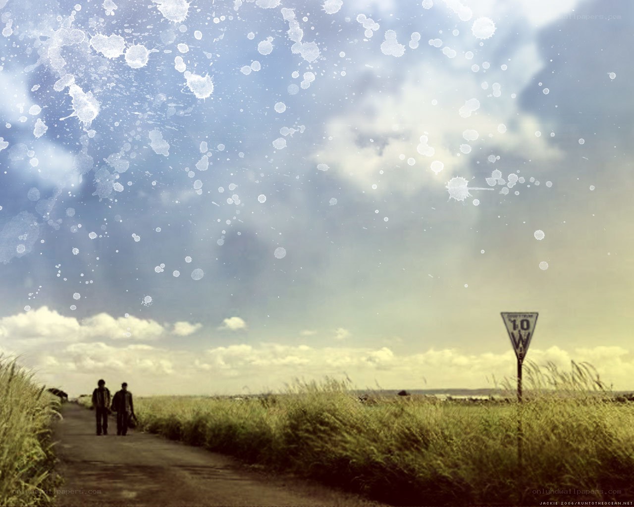 Two people walking on a path