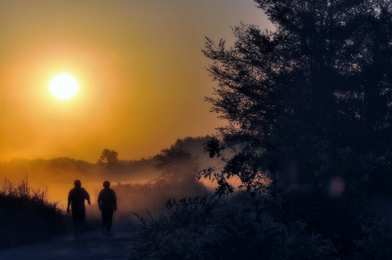Two People Walking — Orange, Serene, Sunrise