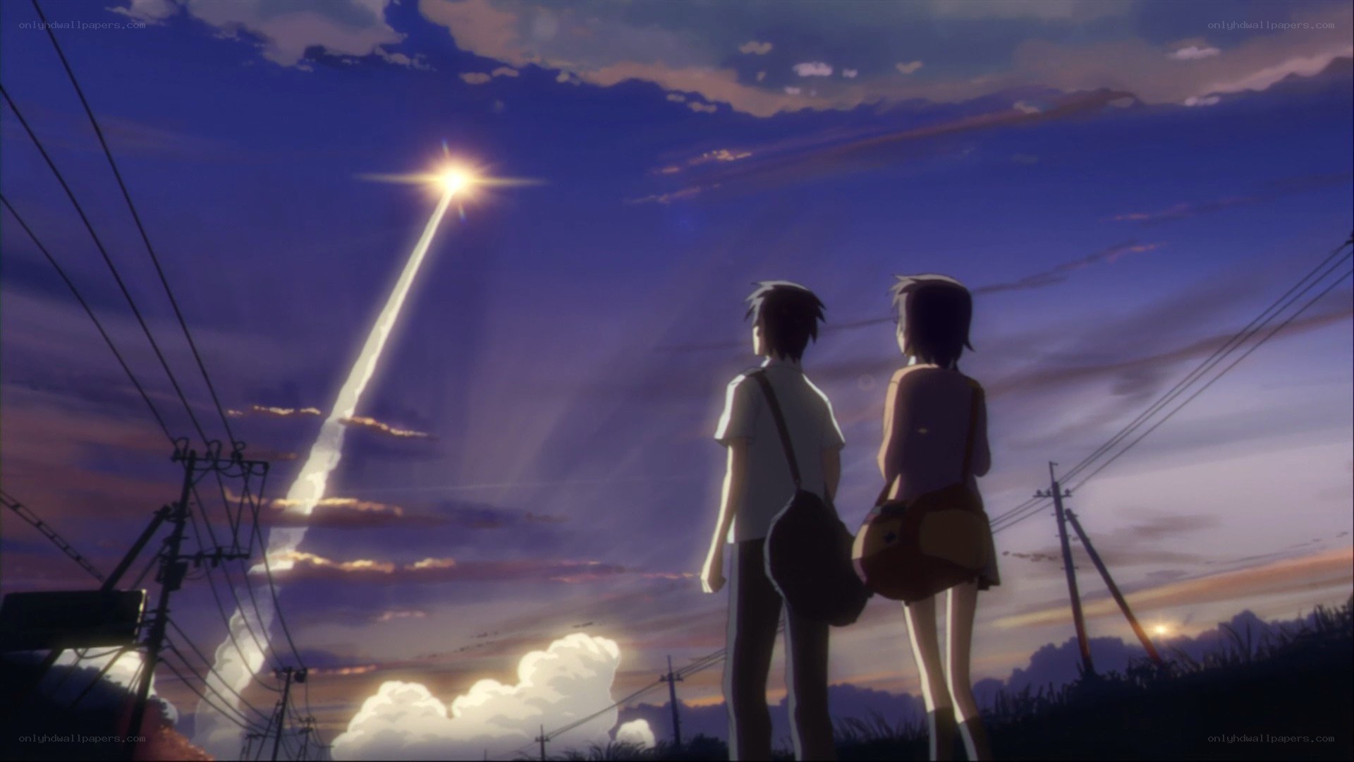 two people watching a meteor