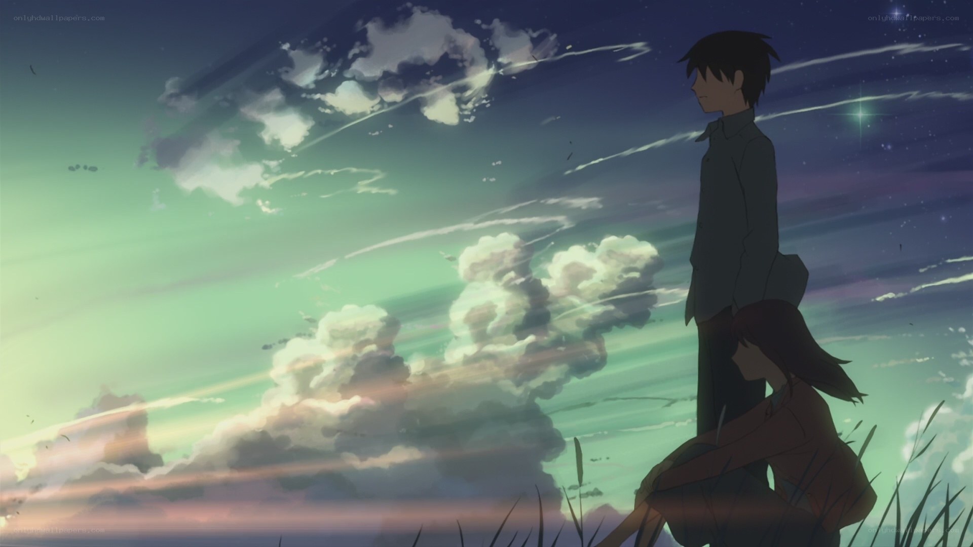 two people watching meteors