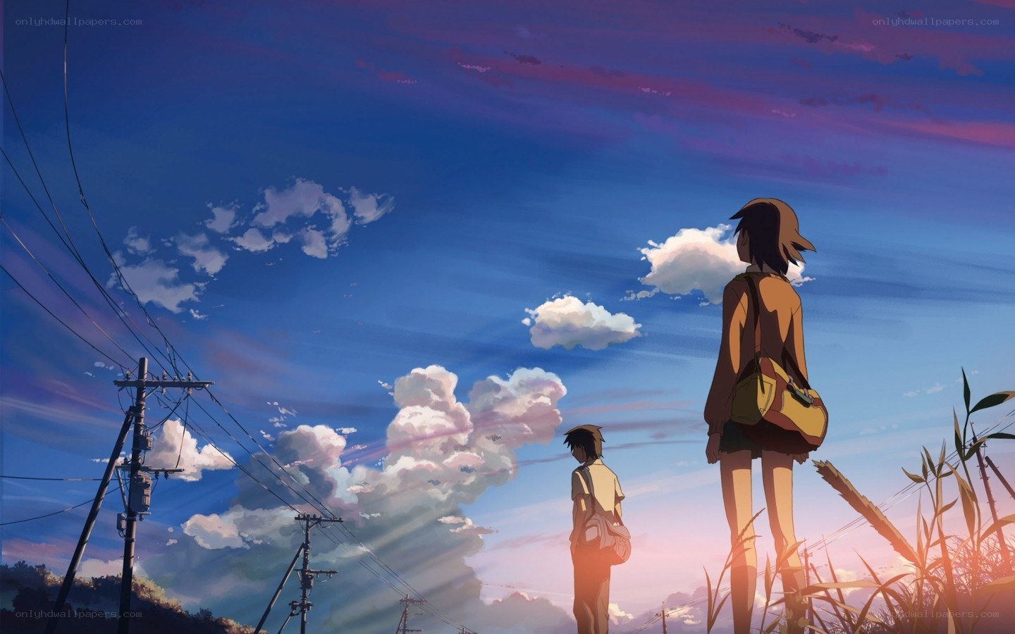two people watching sunset