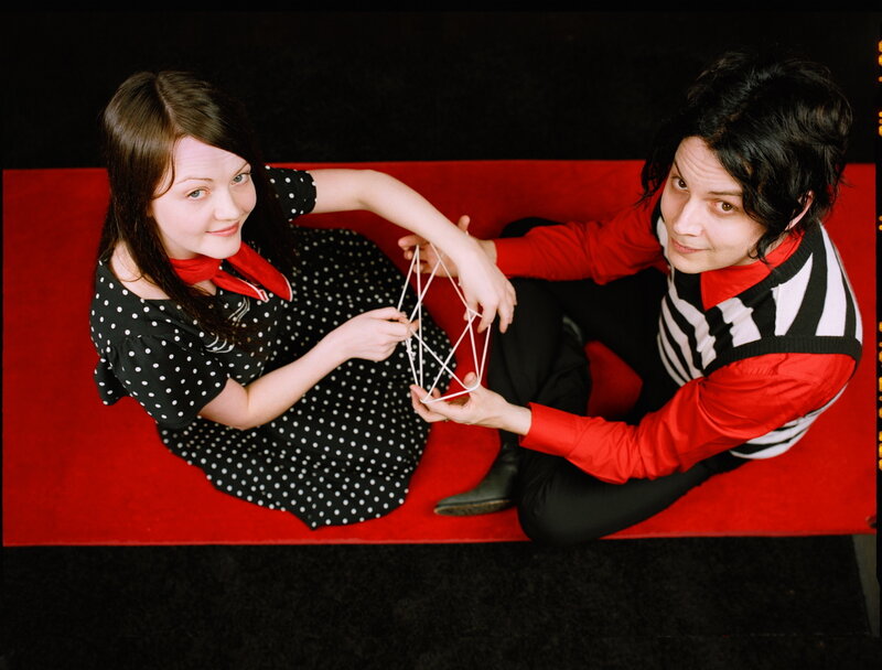 Two people with a geometric model