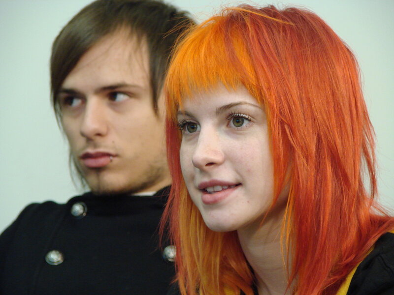 two people with colorful hair