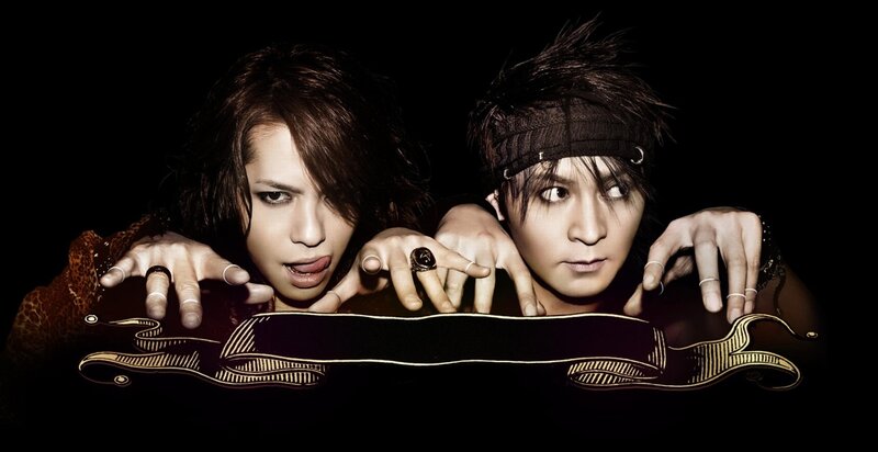 Two People with Dark Hair — Black, Dramatic, Photograph