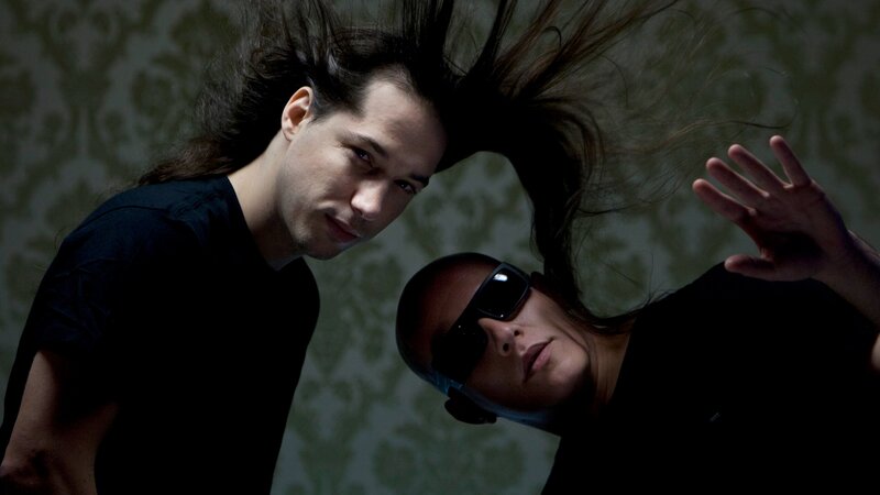 Two people with dynamic hair