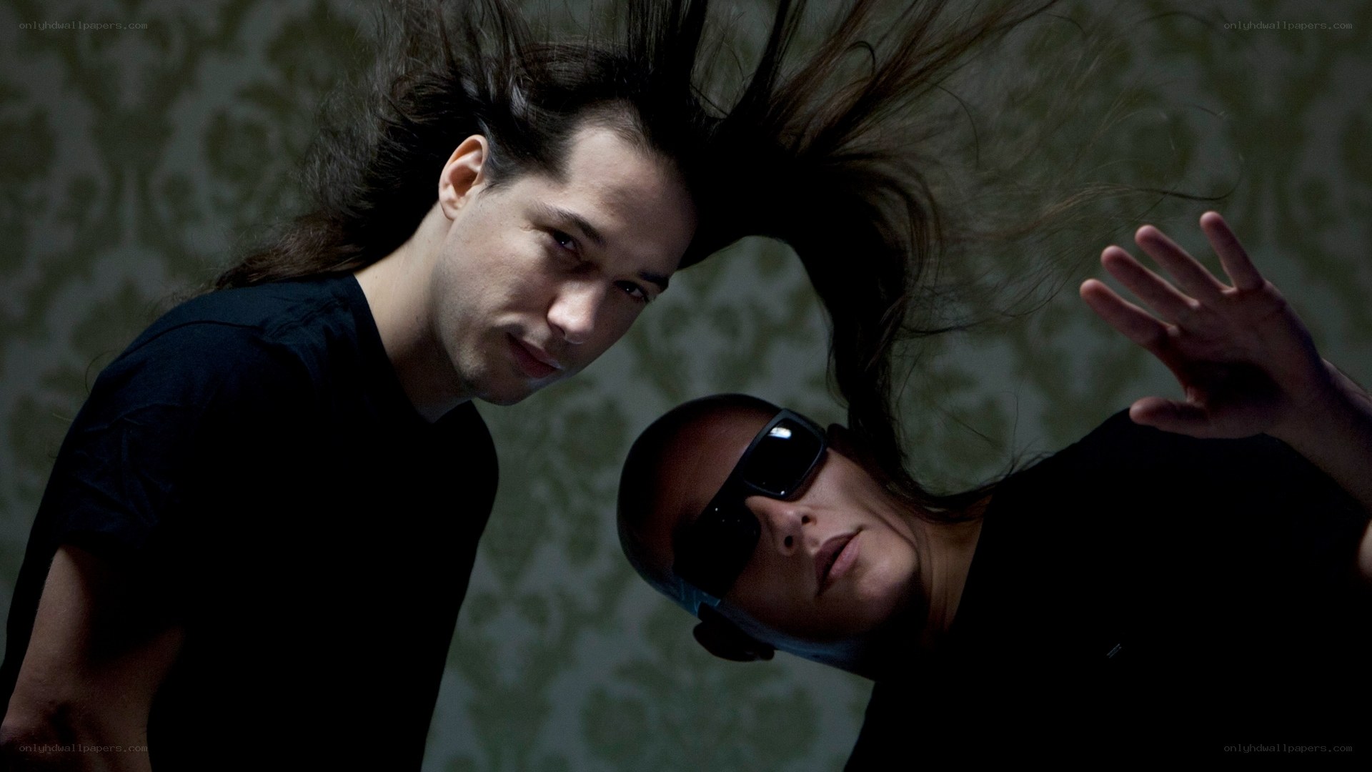 Two people with dynamic hair