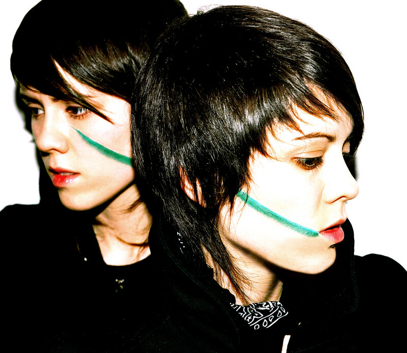 two people with green face paint