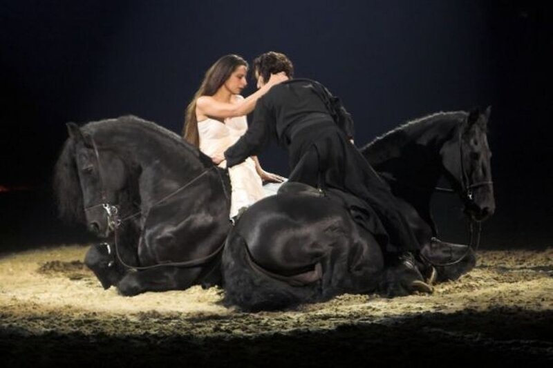 Two People with Horses