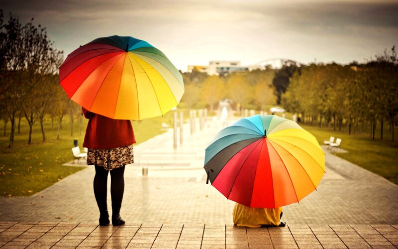 Two People with Umbrellas — Rainbow