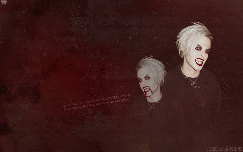 Two People with Vampire Makeup