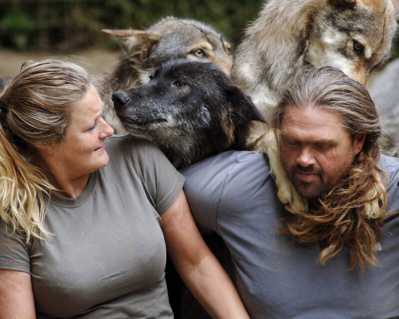 Two People with Wolves