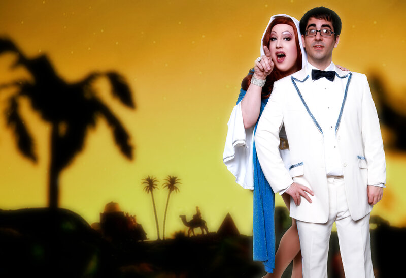 Two performers in desert-themed costumes
