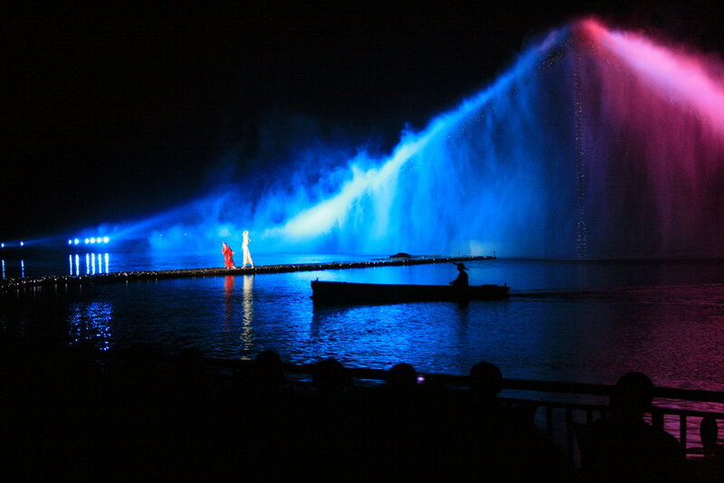 Two Performers on a Pier