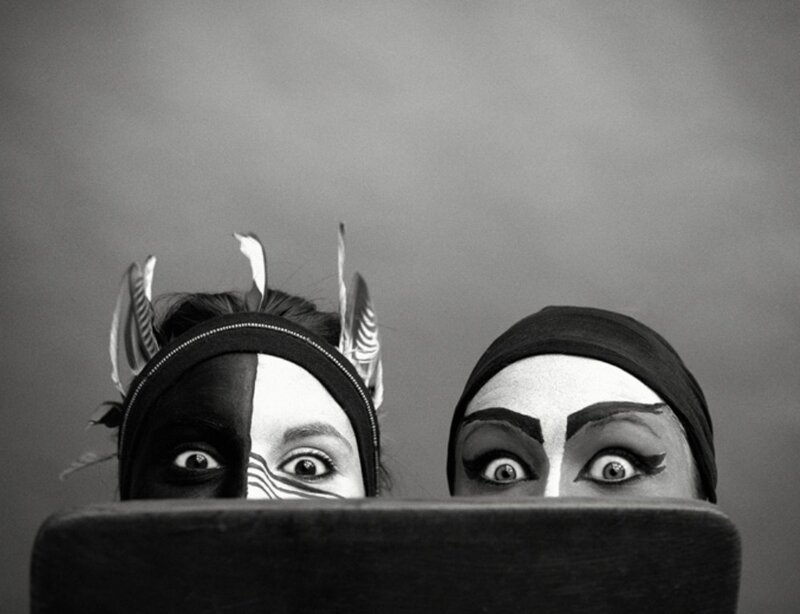 two performers with theatrical makeup